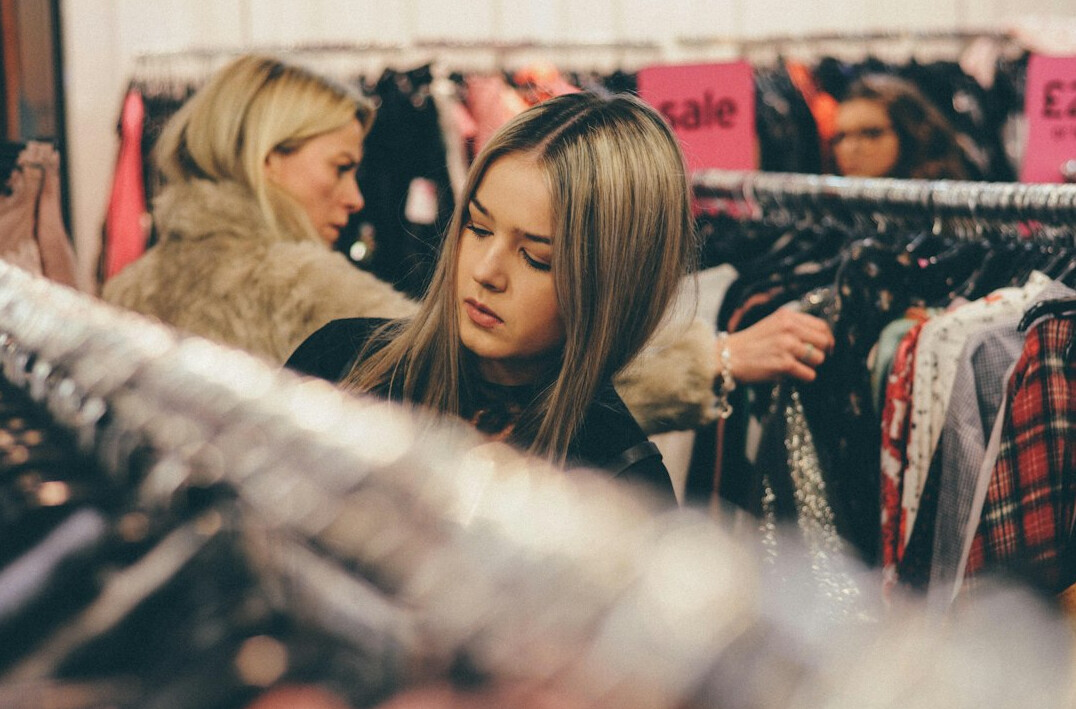 store detective observing shoppers