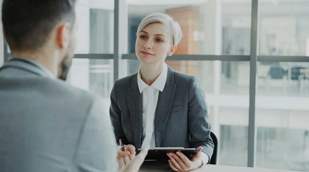 detective interviewing employee